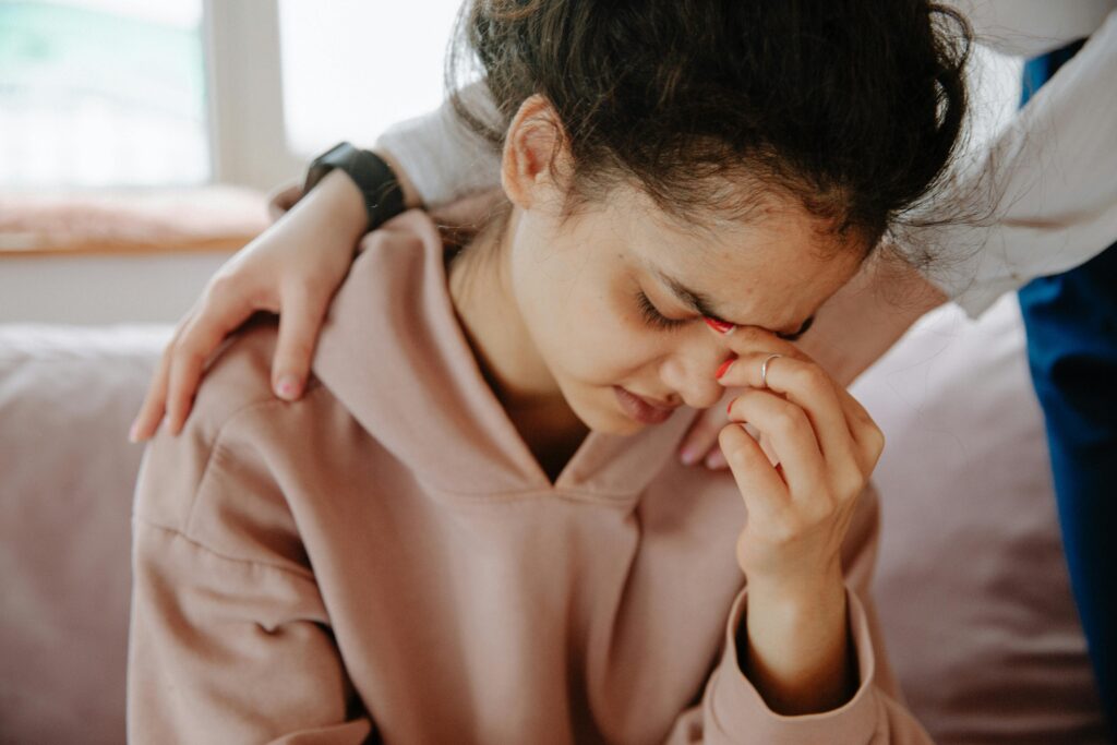 Photographie d'une personne en dépression suite à un traumatisme